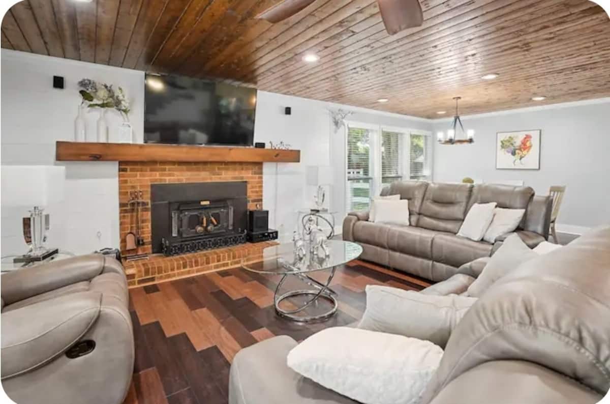 Living room with fireplace inside Casa, the second house on the property